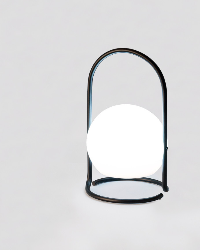La lámpara de mesa portátil color negro de 30x17cm
