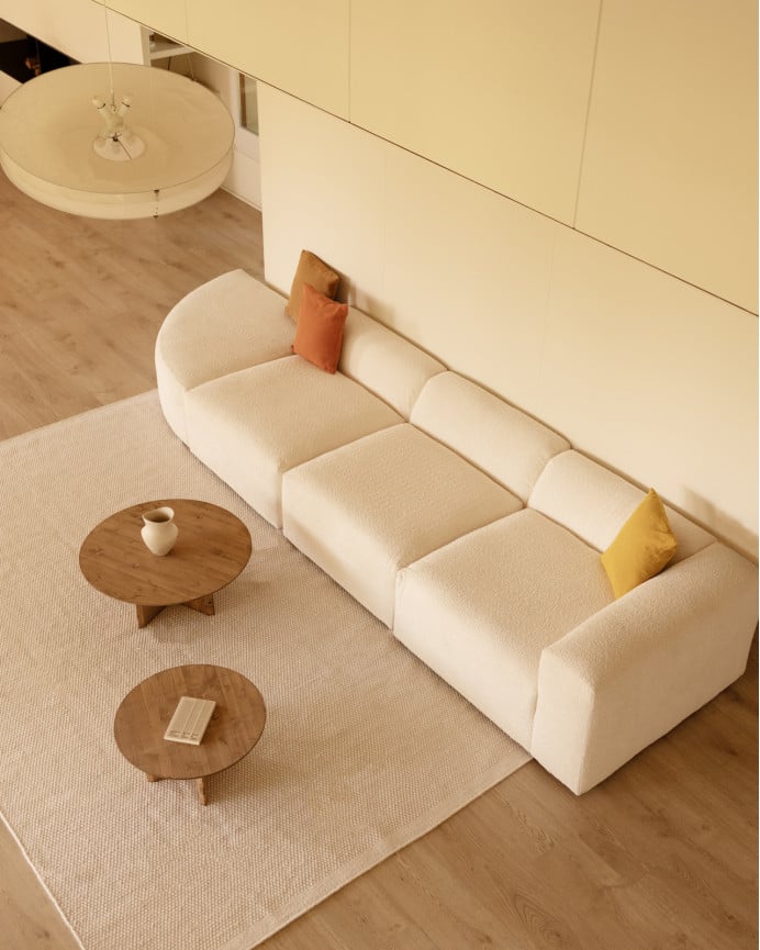 Sofá de 4 módulos con curva de bouclé color blanco 410x110cm