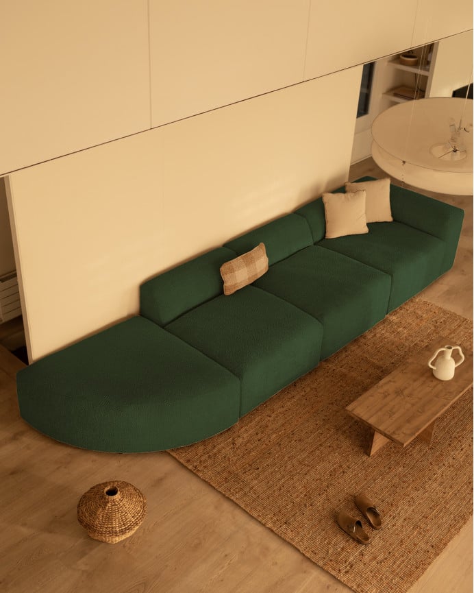 Sofá de 4 módulos con curva de bouclé color verde 410x110cm