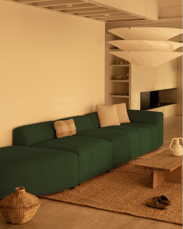 Sofá de 4 módulos con curva de bouclé color verde 410x110cm