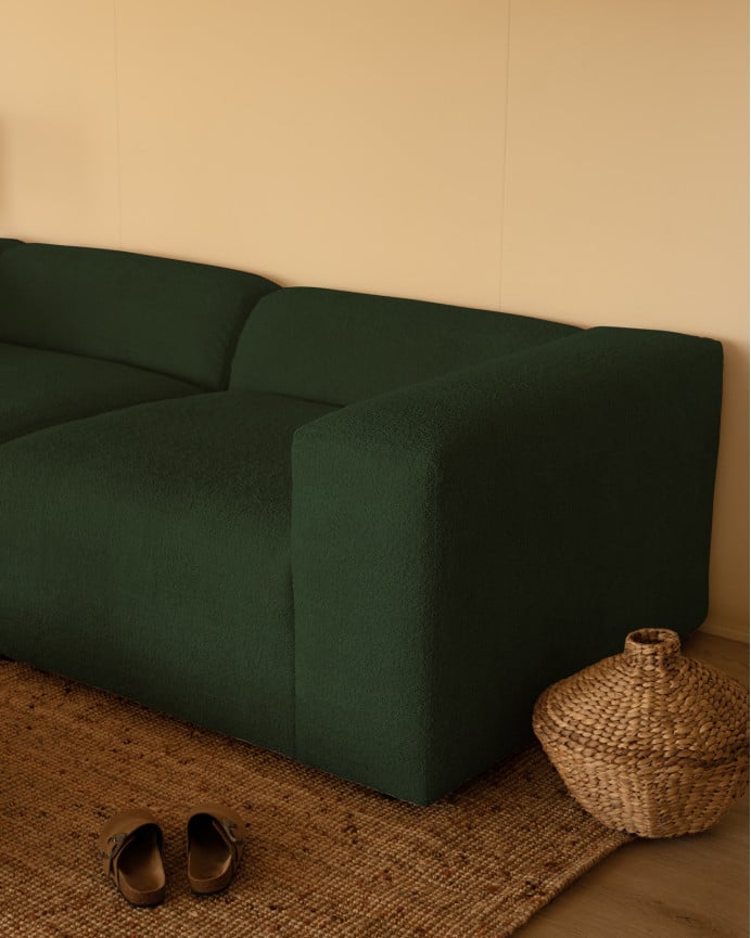 Sofá de 4 módulos con curva de bouclé color verde 410x110cm