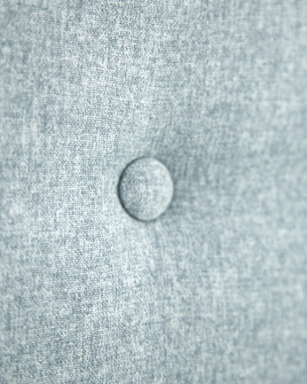 Tête de lit rembourrée en polyester avec boutons bleu de différentes tailles