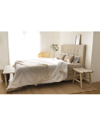 Tête de lit rembourrée en polyester avec plis en beige de différentes tailles