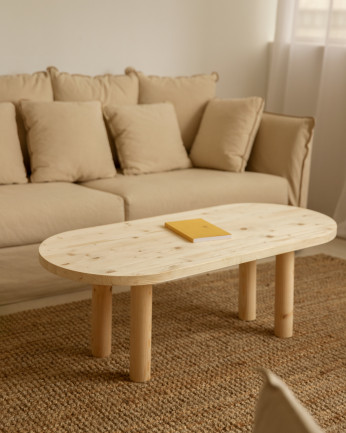 Table basse ovale en bois massif en teinte naturelle de 40x120cm.
