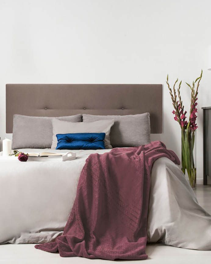 Tête de lit rembourrée en polyester avec boutons roses de différentes tailles