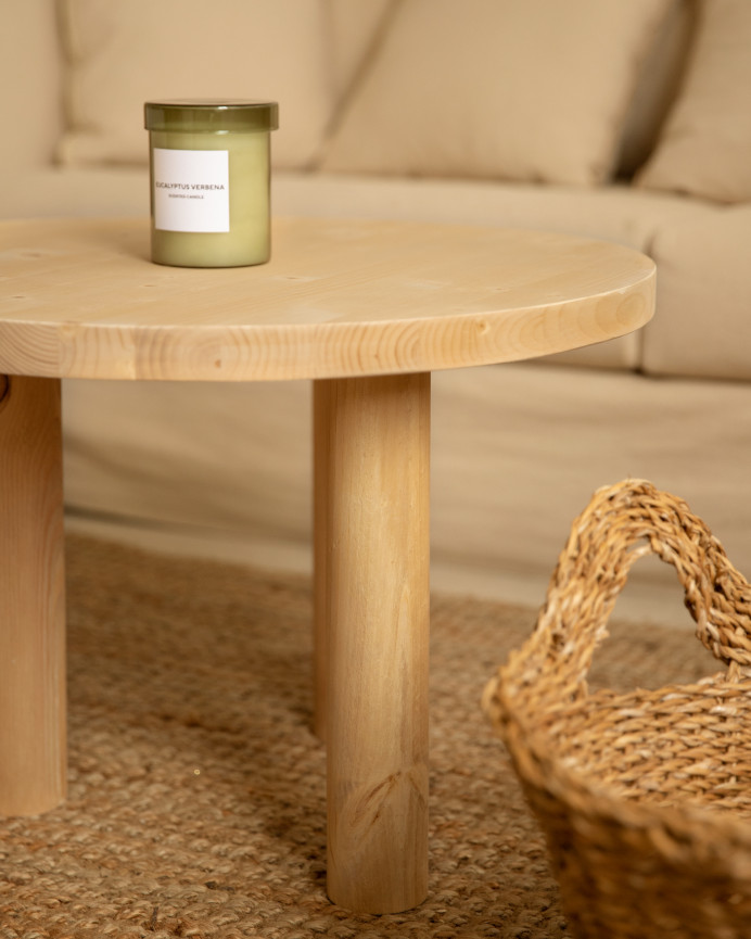 Table basse ronde en bois massif en teinte chêne moyen de 40x60cm.