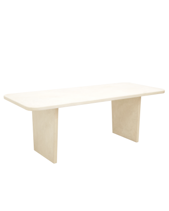 Table à manger en microciment de teinte blanc cassé disponible en différentes tailles