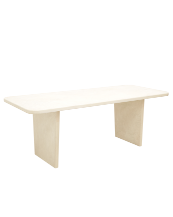 Table à manger en microciment de teinte blanc cassé disponible en différentes tailles