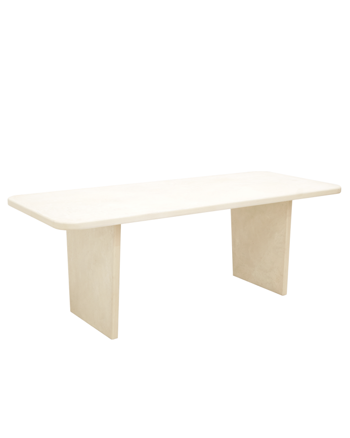 Table à manger en microciment de teinte blanc cassé disponible en différentes tailles