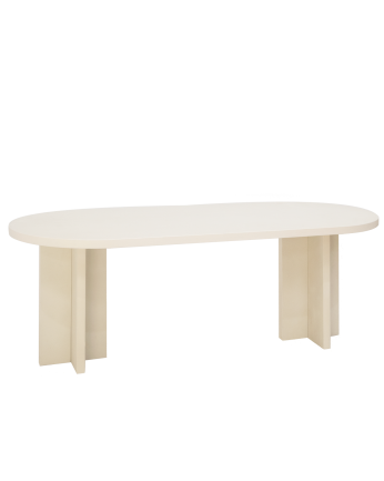 Table de salle à manger ovale en microciment de teinte blanc cassé disponible en différentes tailles