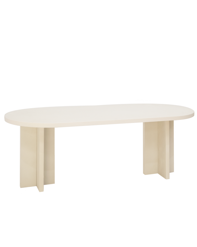 Table de salle à manger ovale en microciment de teinte blanc cassé disponible en différentes tailles