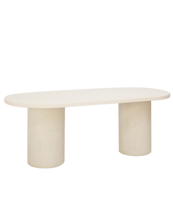 Table de salle à manger ovale en microciment de teinte blanc cassé disponible en différentes tailles