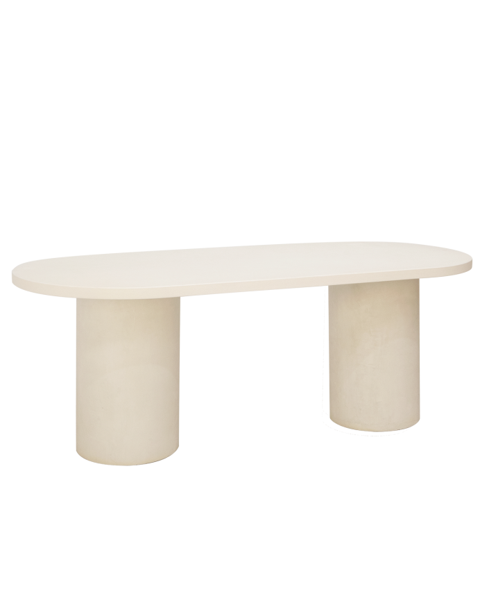 Table de salle à manger ovale en microciment de teinte blanc cassé disponible en différentes tailles