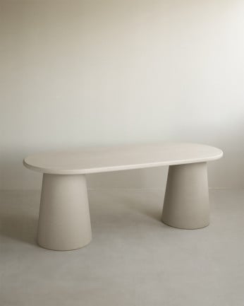 Table de salle à manger ovale en microciment ton beige de différentes tailles