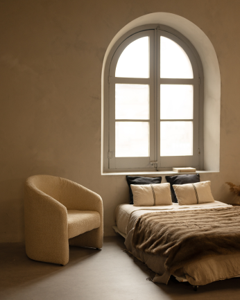Fauteuil rond revêtu en tissu mouton beige 80x85cm