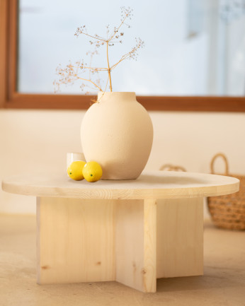 Tavolo da centro rotondo in legno massello con finitura naturale di varie misure.