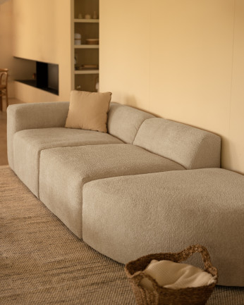 Divano a 3 moduli con curva in bouclé di colore grigio chiaro 320x110cm