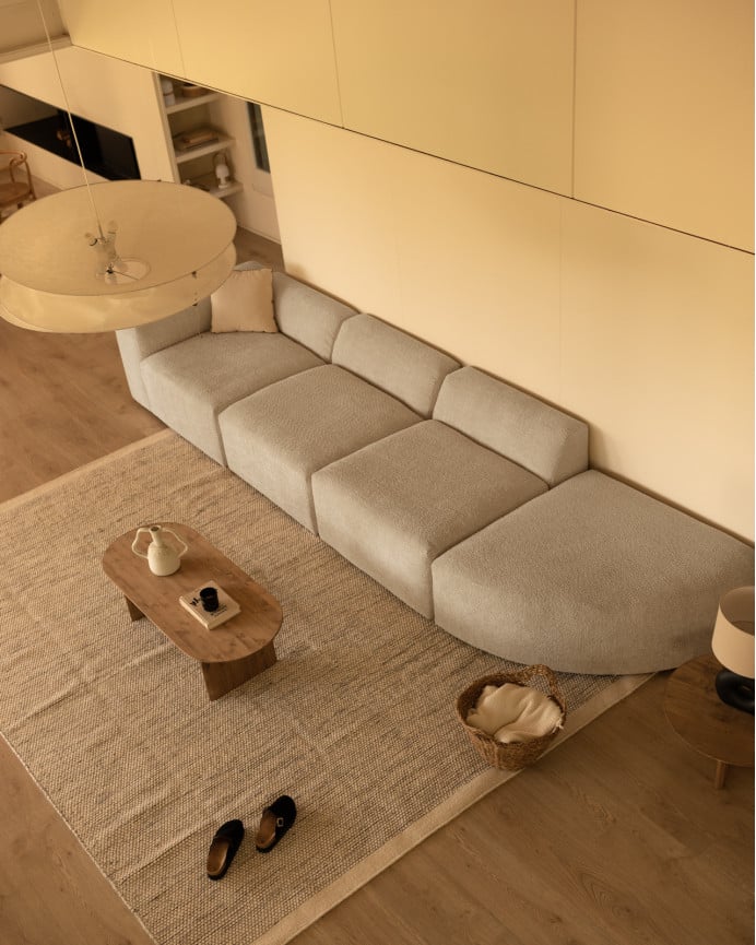 Divano a 4 moduli con curva bouclé in grigio chiaro 410x110cm