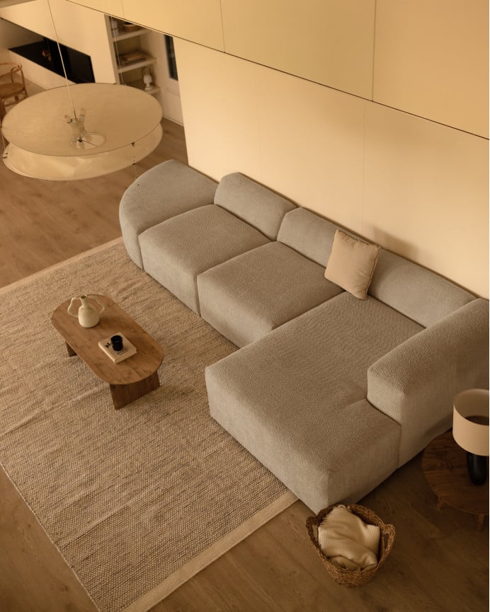 Divano curvo a 4 moduli con chaise longue in bouclé grigio chiaro 410x172cm