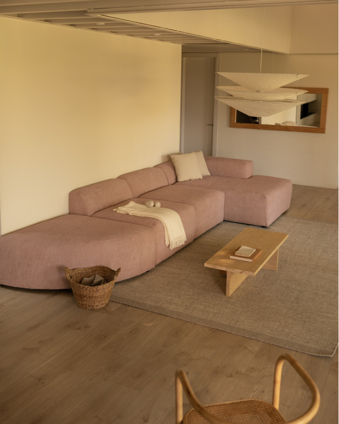 Divano curvo a 4 moduli con chaise longue in bouclé rosa 410x172cm