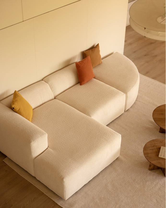 Divano curvo a 3 moduli con chaise longue in bouclé bianco 320x172cm