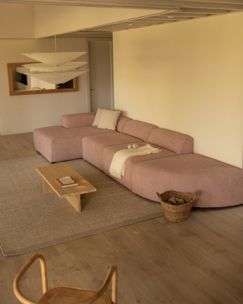 Divano curvo a 4 moduli con chaise longue in bouclé rosa 410x172cm