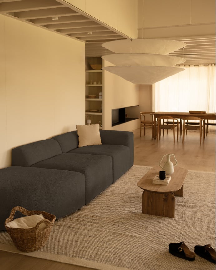 Divano a 3 moduli con curva in bouclé colore grigio scuro 320x110cm