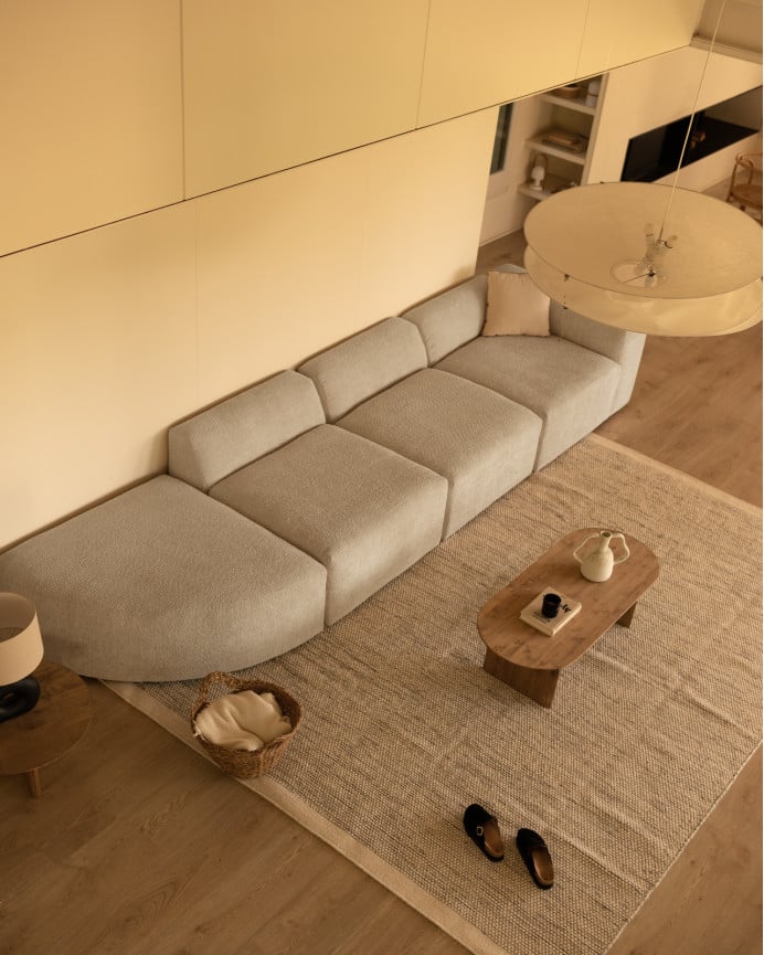 Divano a 4 moduli con curva di bouclé in grigio chiaro 410x110cm