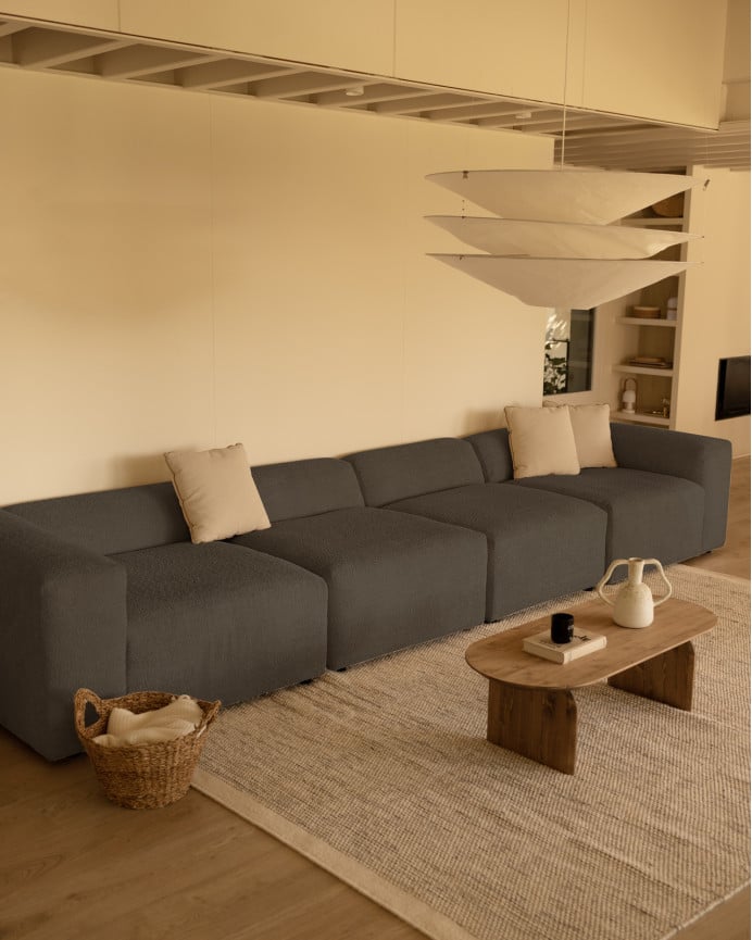 Divano a 4 moduli in bouclé di colore grigio scuro 420x110cm