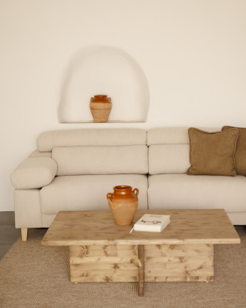 Divano con chaise longue di colore beige di varie misure