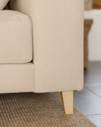 Divano con chaise longue di colore beige di varie misure