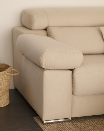 Divano con chaise longue di colore beige di varie misure