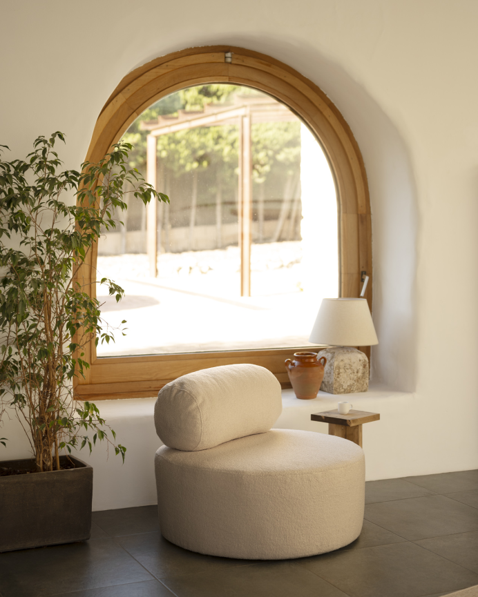 Poltrona rotonda in colore beige da 91x71cm